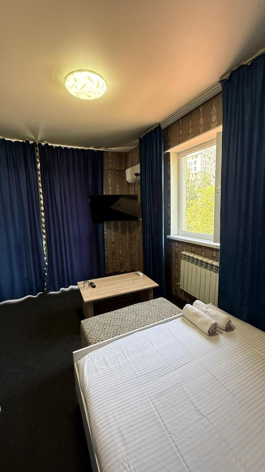 Пана Hotel Алма Ата Екстериор снимка